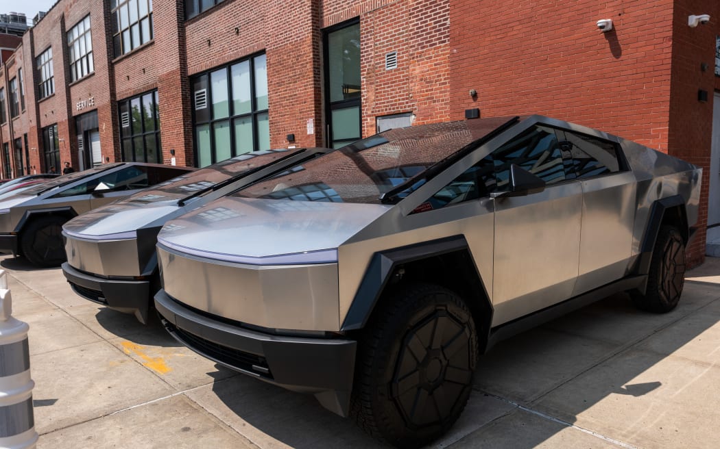 NEW YORK, NEW YORK - JUNE 05: Tesla Cybertrucks sit outside of a dealership on June 05, 2025 in the Brooklyn borough of New York City. As the relationship between Tesla CEO Elon Musk and U.S. President Donald Trump becomes increasingly strained, shares of Tesla dropped by more than 14% on Thursday.   Spencer Platt/Getty Images/AFP (Photo by SPENCER PLATT / GETTY IMAGES NORTH AMERICA / Getty Images via AFP)