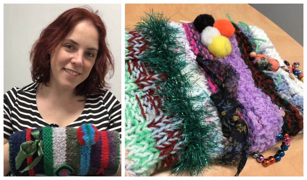 Kat Arney with a Twiddlemuff fidgeting device for people with dementia