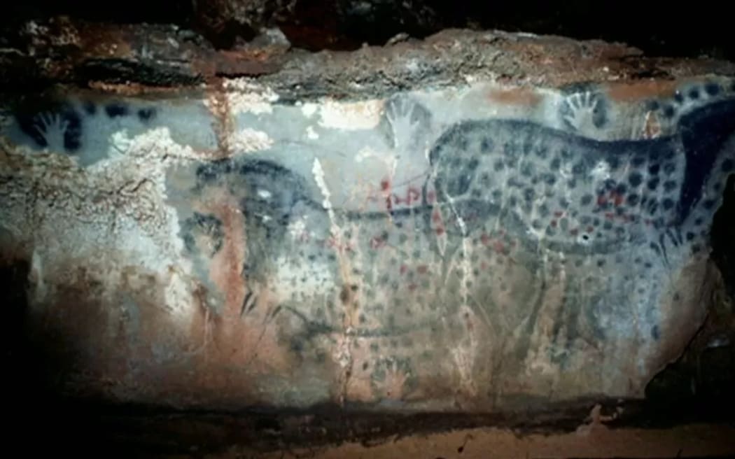These hand stencils and wild horses were created about 30,000 years ago.