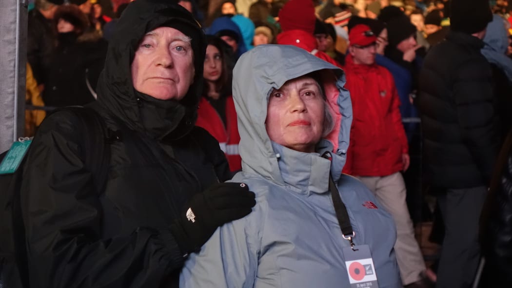 A couple keeps warm during the services at Gallipoli.