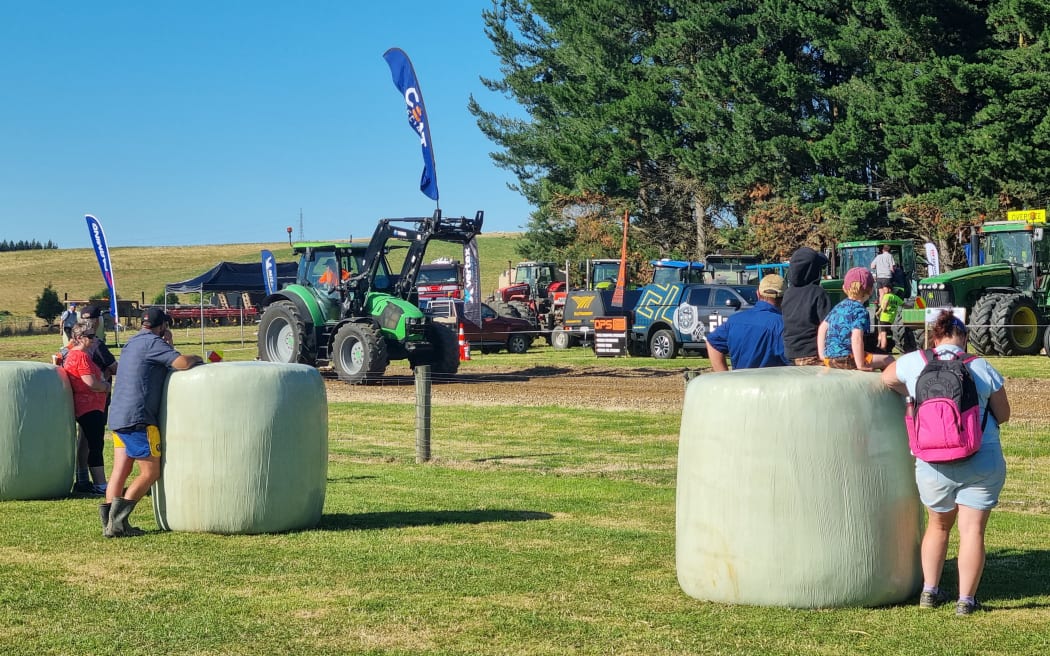 People watch the tractor pull event at Southern Field Days.
