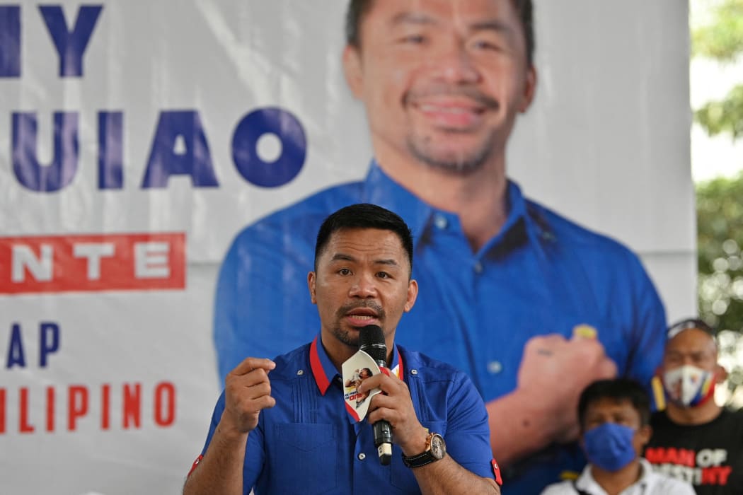 Manny Pacquiao speaks during a campaign stop ahead of the 9 May presidential election, in suburban Manila on 16 February, 2022.