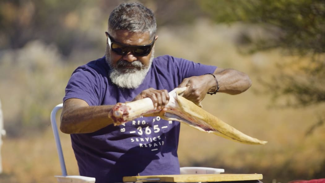 Uncle Des preparing the kangaroo tail