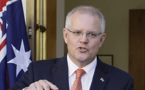 Australian Prime Minister Scott Morrison addresses the media at Parliament House in Canberra, 13 February 2019.