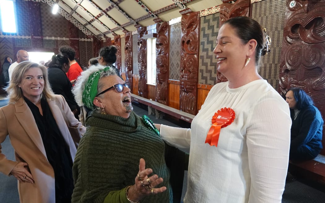 Candidates Maki Herbert, left, (Aotearoa Legalise Cannabis Party) and Willow-Jean Prime, right, (Labour) greet each other at Otiria Marae.