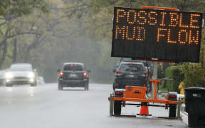 A sign reading 'Possible Mud Flow' on March 12, 2025, in Sierra Madre, California.