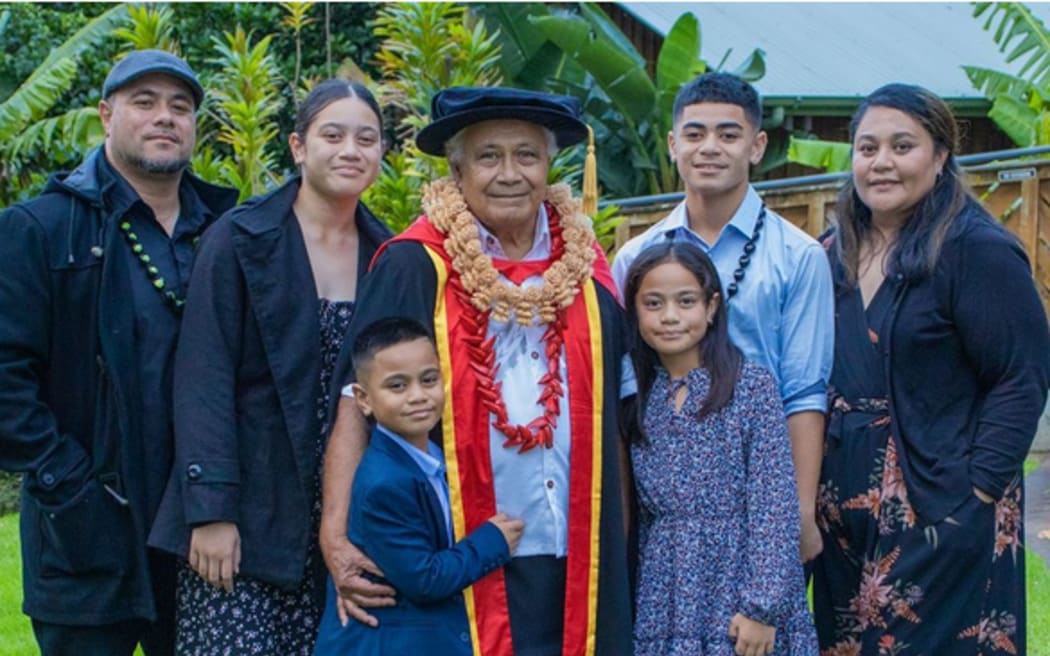 Muliagatele Vavaō Fetui and his proud aiga, his son, left, daughter-in-law and grandchildren, on graduation day outside the Fale Pasifika at Waipapa Taumata Rau, University of Auckland