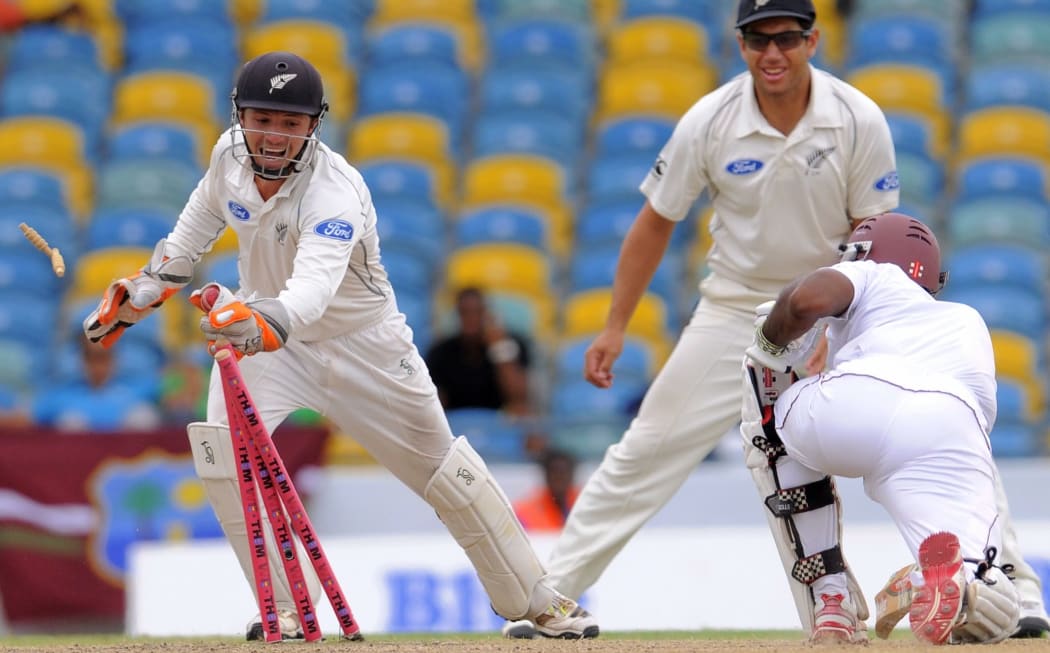 B J Watling stumps West Indies batsman Shivnarine Chanderpaul in the 3rd test win in Barbados.