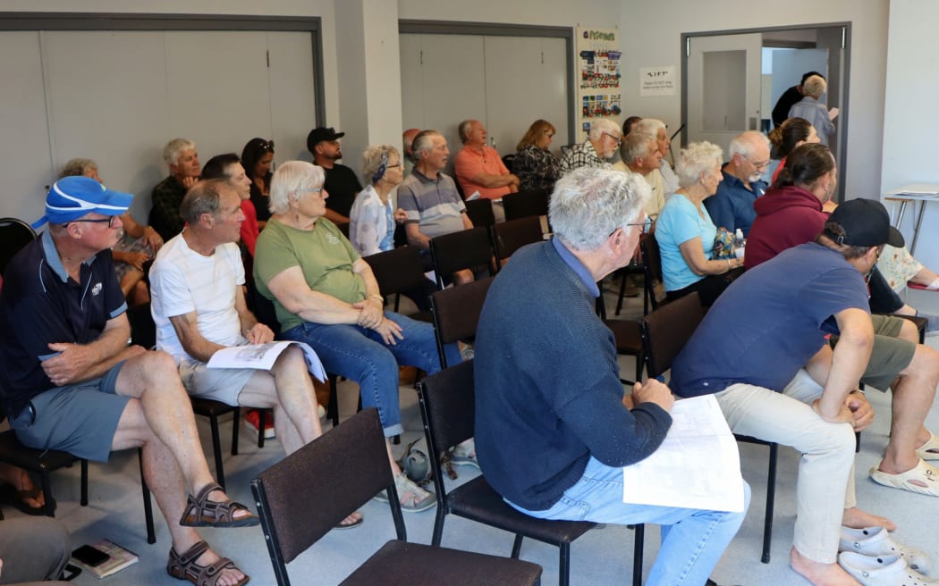 Around a dozen people from the public forum spoke in support of Ross Goudie. Photo / Alisha Evans