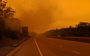 The fires around Port Macquarie have given the entire region an eerie orange tinge, with one resident describing the scene as "apocalyptic".