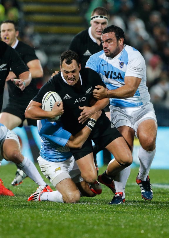 New Zealand's Israel Dagg is tackled during the All Blacks' test match against the Pumas in Napier.