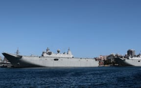 Australia - 02/23/2019 - ARCHIVE, NEW INTERNATIONAL MILITARY PACT - Ships HMAS Canberra (L 02) and HMAS Adelaide (L 01) are seen docked at a port in Sydney, Australia, on February 23, 2019, in photo of file. Australia, the United Kingdom and the United States announced a new military pact, the AUKUS, following concerns about China's growing military presence in the Pacific and Indian Oceans. Photo: Ettore Chiereguini/AGIF (Photo by Ettore Chiereguini / AGIF / AGIF via AFP)