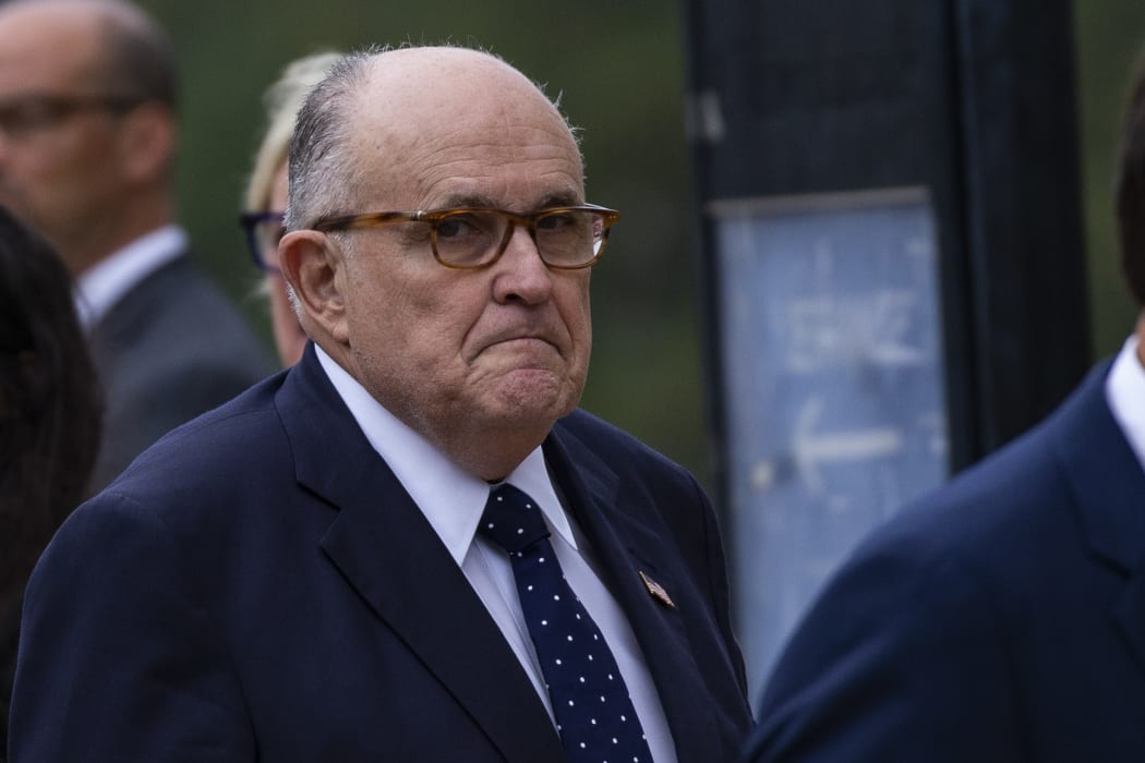 Donald Trump's lawyer Rudy Giuliani, arrives for the funeral service for late United States Senator John McCain (Republican of Arizona) at the Washington National Cathedral in Washington, DC on September 1, 2018.