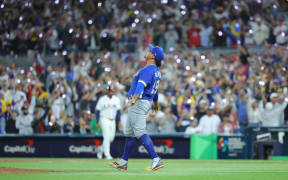 Venezuelan pitcher Daniel Palencia reacts after winning the World Baseball Classic final against USA, 2026.