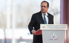 President Francois Hollande was speaking in Villognon, central France, at the opening of a rail line when the shots were fired.