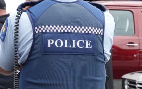 Auckland, New Zealand - October 10, 2019 : Close up of a New Zealand police officer's uniform and badge