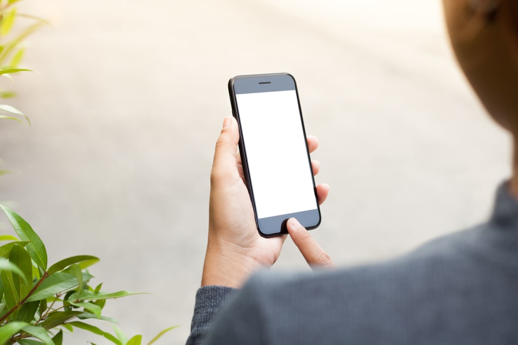 close-up phone mobile in woman hand holding and touch on blank screen, new modern people lifestyle