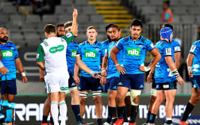 Blues Tanielu Tele'a receives a red card.