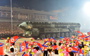 A missile is displayed during a military parade in Pyongyang to commemorate the 70th anniversary of the Korean War armistice.