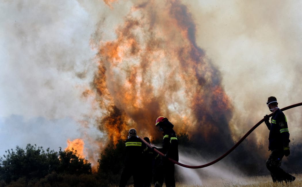 Fourth consecutive day of the wildfire at Attica at the region of Agios Stefanos, on August 6, 2021. Alexandros Michailidis / SOOC (Photo by Alexandros Michailidis / SOOC / SOOC via AFP)