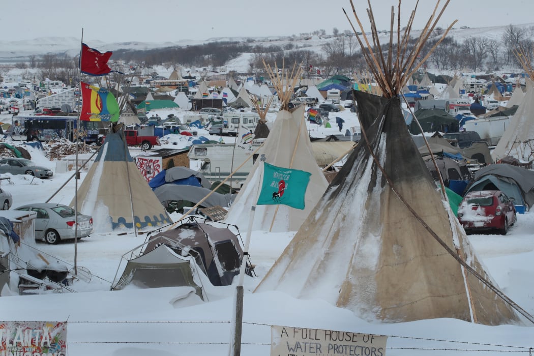 Snow covers Oceti Sakowin Camp near the Standing Rock Sioux Reservation on November 30, 2016 outside Cannon Ball, North Dakota. Native Americans and activists from around the country have been gathering at the camp for several months trying to halt the construction of the Dakota Access Pipeline.