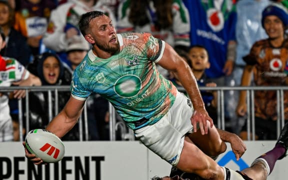 Kurt Capewell of the Warriors looks to pass against Brisbane Broncos.