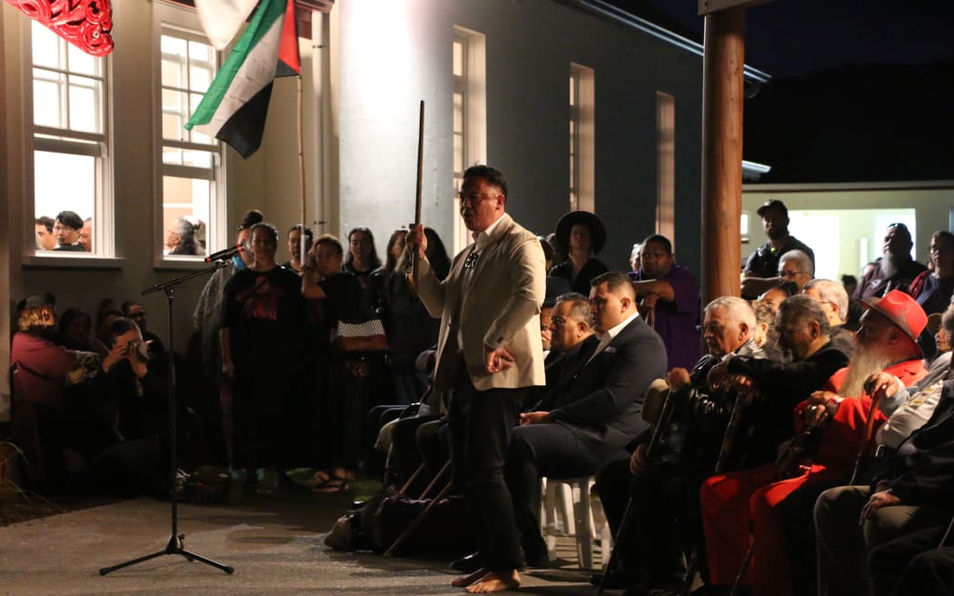 Marae Pou Tīkanga Isaiah Apiata delivers his whaikōrero at dawn ceremony for reopening of te whare tūpuna at Waitangi 2025.
