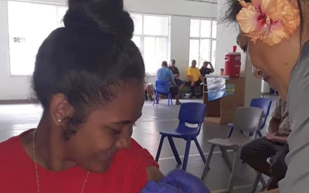 A Covid-19 vaccine being given in June in American Samoa.