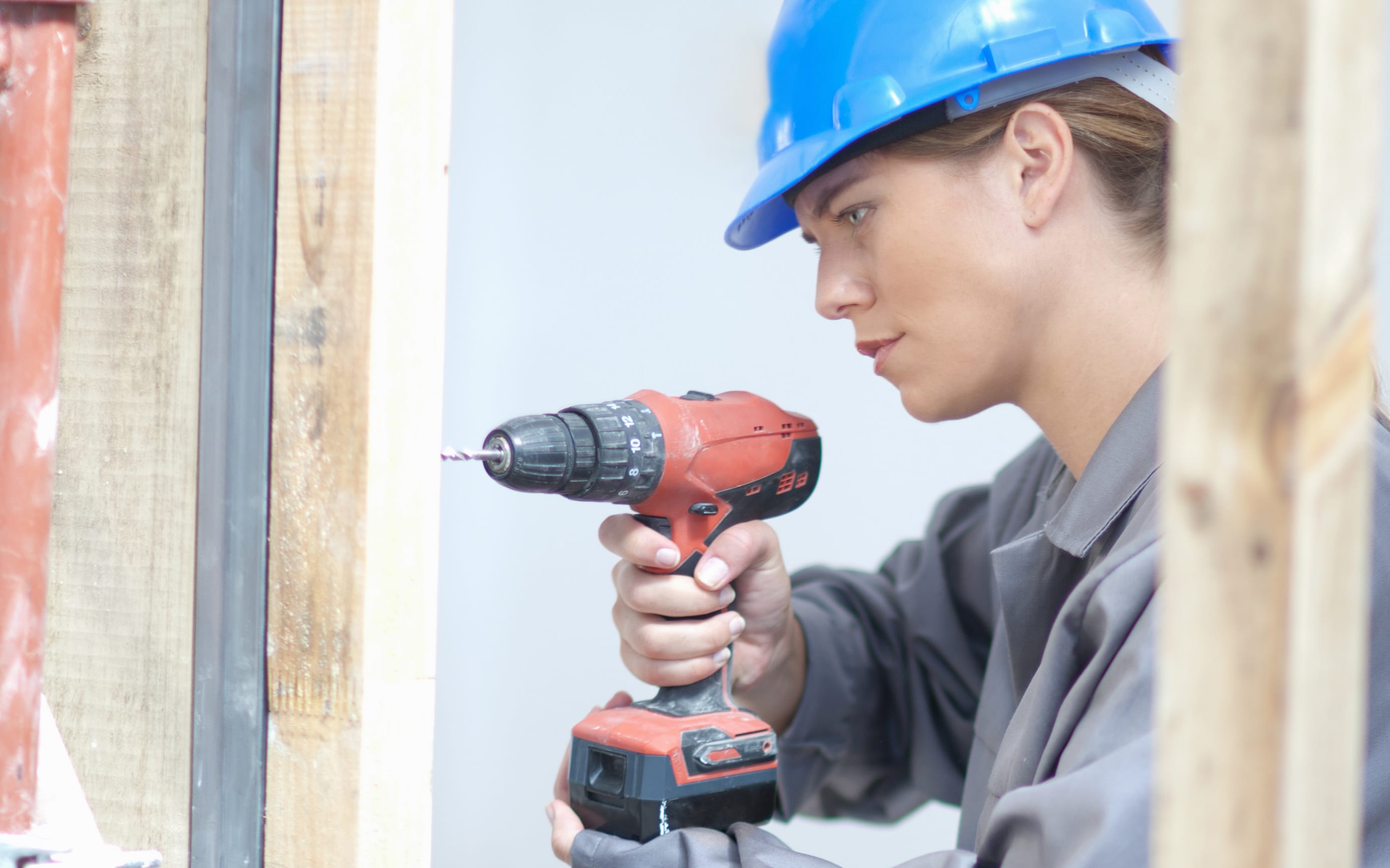Woman working on construction site.