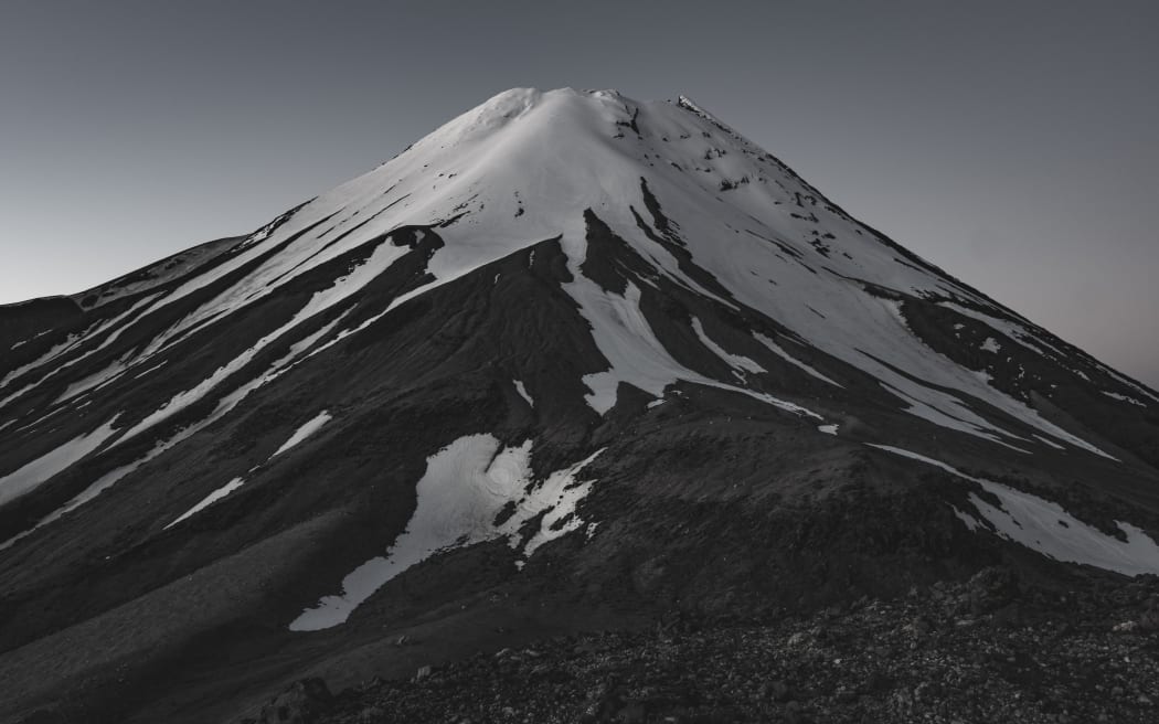 Two climbers approached Mount Taranaki as day walk rather than