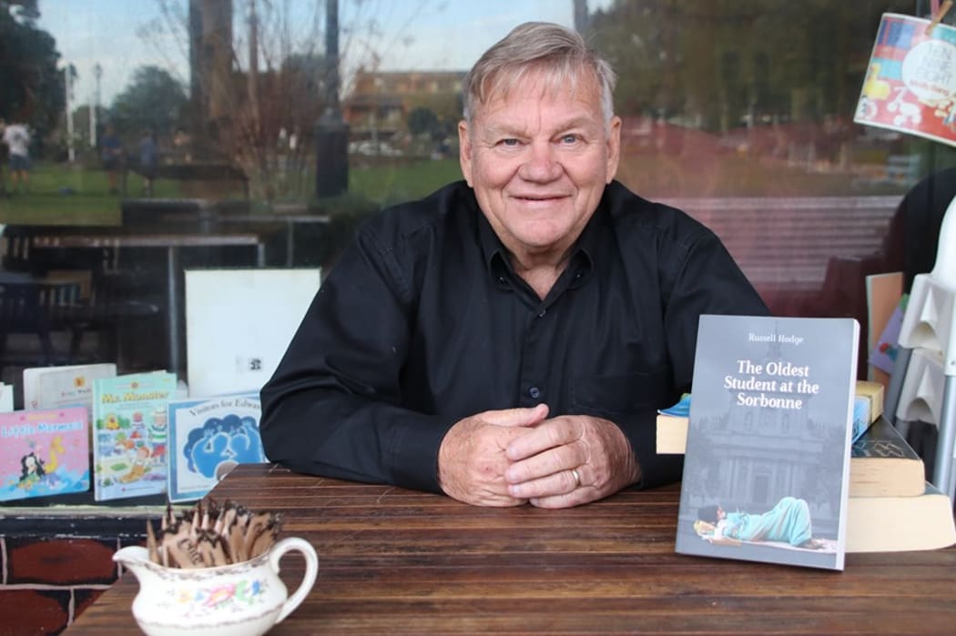 Author Russell Hodge signing his book 'The Oldest Student at the Sorbonne'