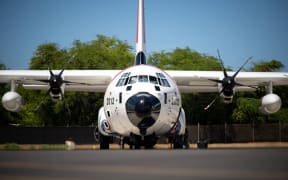 A U.S. Coast Guard HC-130J Hercules aircraft parked on the flightline at Air Station Barbers Point, Oahu, HI, Aug. 15, 2024. This aircraft is used for search and rescue missions, maritime patrol, and logistical operations. (U.S. Air National Guard photo by Staff Sgt. Joseph Pagan).