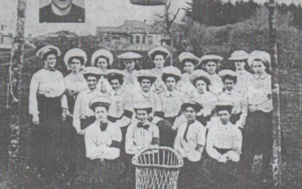 The St Luke’s Presbyterian Bible Class A & B basketball teams 1906. They played a demonstration game in a paddock in Mt Eden, Auckland. It's likely this was a nine-aside game. Reverend J. C. Jamieson's photo is inset.