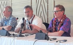 Fa'aolesa Katopau Ainu'u speaking to reporters alongside members of the UN Committee on the Rights of the Child