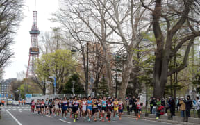 Athletes compete at the half-marathon race which doubles as a test event for the 2020 Tokyo Olympics, in Sapporo on May 5, 2021.
