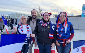 Gulei Durand (right) Jeremy Durand (second left) with their mother (left).