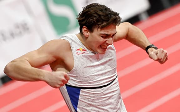 Sweden's Armand Duplantis celebrates after breaking his own pole vaulting world record at the World Athletics Indoor Tour Silver meeting in Belgrade 202.