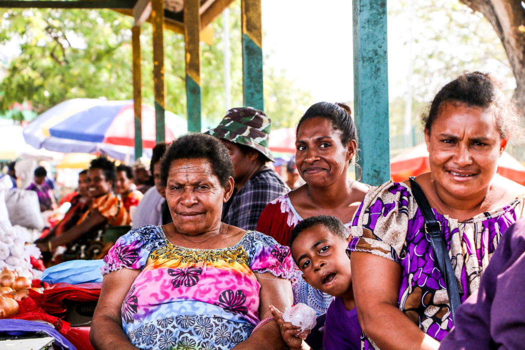 Women in PNG at a market in Port Moresby
