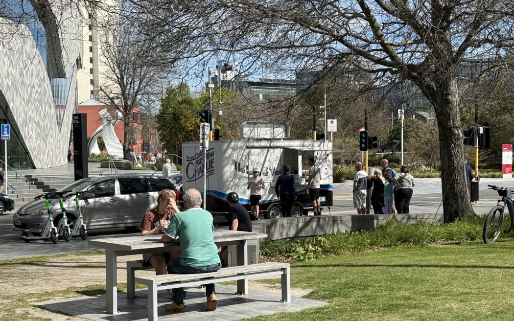 People enjoy an ice cream from Ice Cream Charlie in Christchurch.