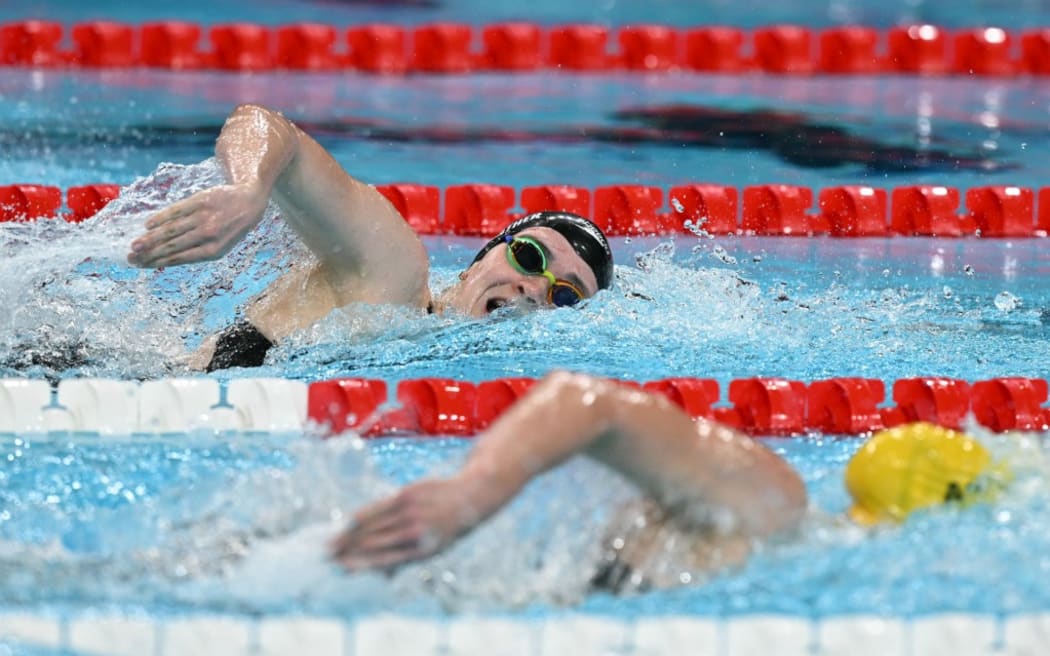 New Zealand's Erika Fairweather competes in a heat of the women's 200m freestyle swimming event during the Paris 2024 Olympic Games at the Paris La Defense Arena in Nanterre, west of Paris, on July 28, 2024. (Photo by Oli SCARFF / AFP)