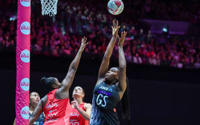 New Zealand's Grace Nweke shoots against England in their Nations Cup test.