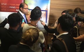 Singapore government communications minister Dr Janil Puthucheary faces the press on the proposed law to fight fake news.