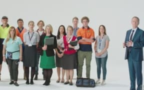 A screenshot from the campaign video shows Labor leader Bill Shorten with a group of mainly white Australians.