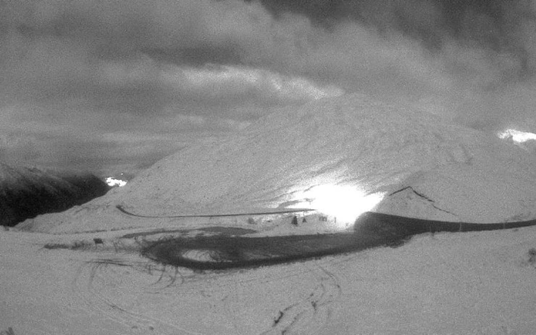 The Crown Range coated in snow on the evening of 4 June 2023.