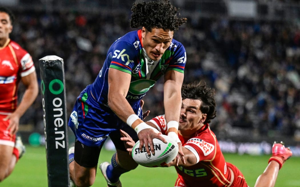Dallin Watene-Zelezniak of the Warriors dives to score a try, NZ Warriors v Dolphins.