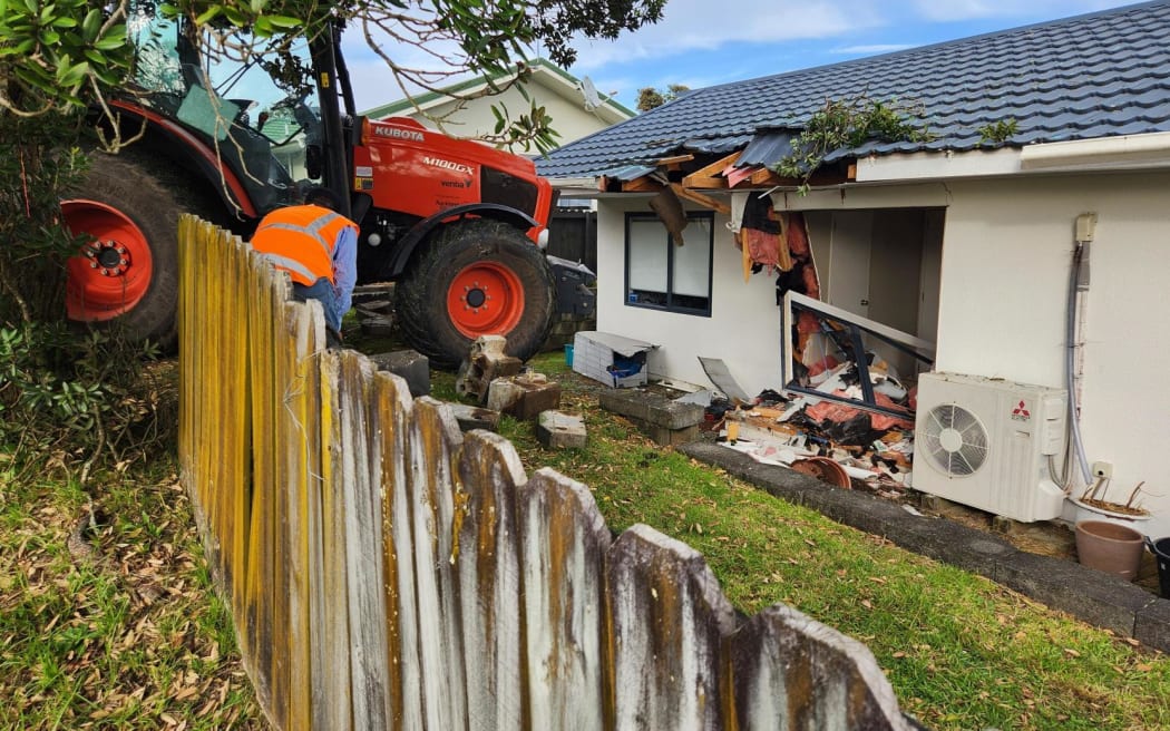 A tractor crashed into a house on Glenfield Road, North Shore, Auckland on 12 April 2023.