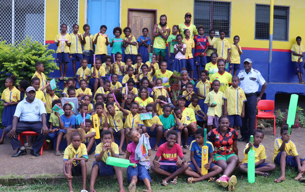 Social Impact and Inclusion Program  Ambassadors and Vanuatu Police with students from Ecole Publique de Centre Ville.