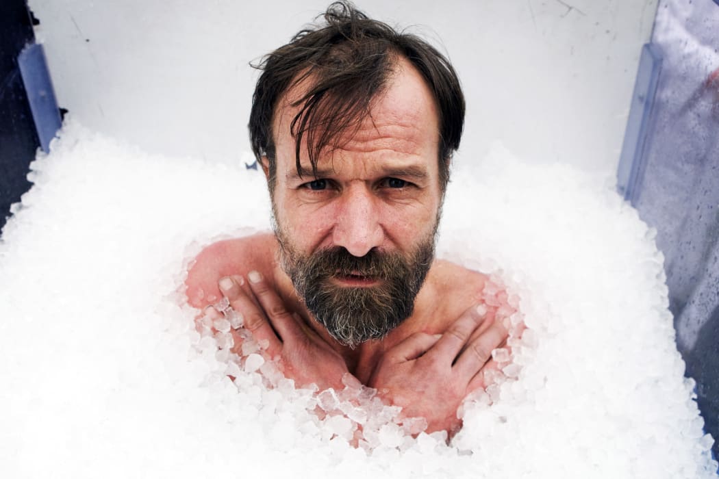 Iceman Wim Hof is covered with more than 700 kilo ice cubes during his new world record attempt. On December 31st 2009, he set a World Record of 44 minutes and 9 seconds.