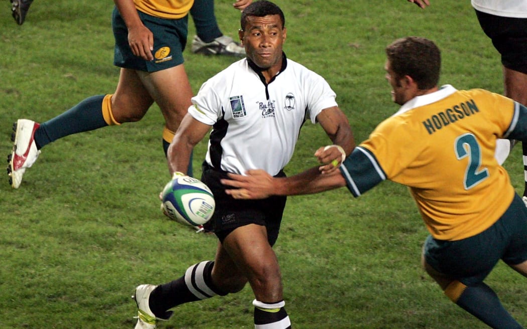 Fiji's Waisale Serevi evades the tackle of Australia's Matt Hodgson during the 2005 Rugby World Cup Sevens. Both will feature in the Fiji Legends v Classic Wallabies match on Saturday.
