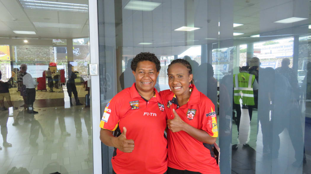 Orchids co-captains Janet John (left) and Angela Watego